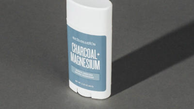 Image of Schmidt's charcoal and magnesium deodorant with shadow behind and gray background
